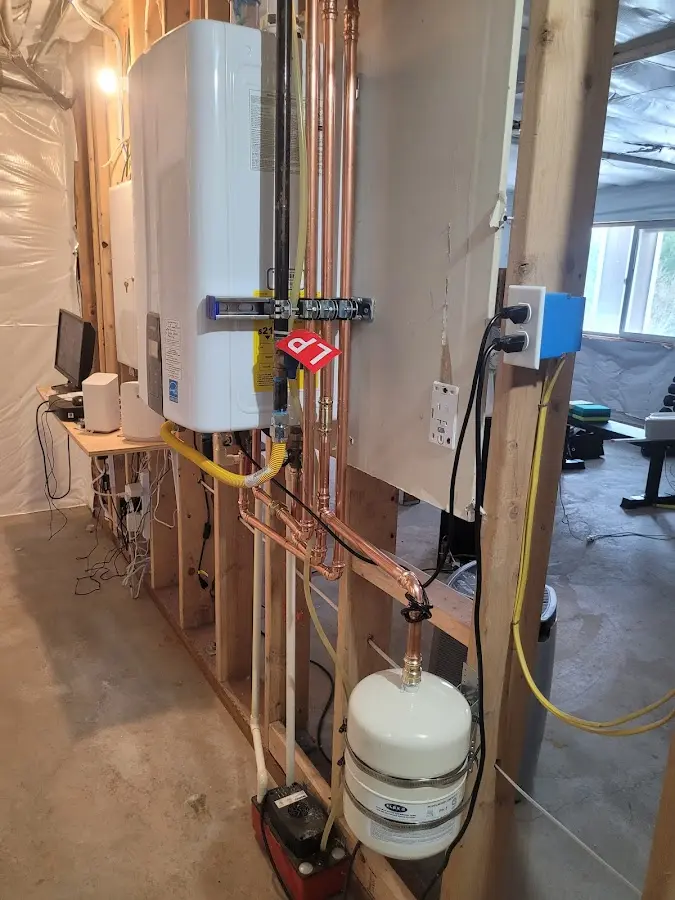 Licensed plumber repairing a kitchen sink in West Perrine