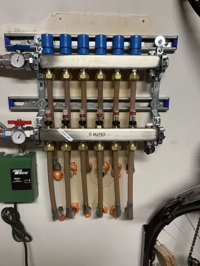 Plumber performing Water Heater Repair at a residential property in West Perrine